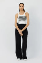 Model showcasing the Breton Stripe Gillian Knit Tank, highlighting the pointelle details and classic stripe pattern.