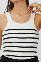 Model showcasing the Breton Stripe Gillian Knit Tank, highlighting the pointelle details and classic stripe pattern.