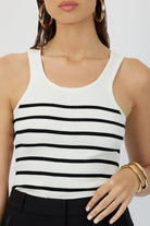 Model showcasing the Breton Stripe Gillian Knit Tank, highlighting the pointelle details and classic stripe pattern.