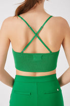 The Glow knitted bra in kelly green by Greyven