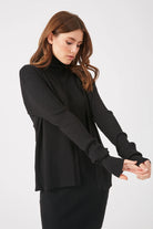 Model wearing the Black Grant Open Cardigan, demonstrating its versatility and elegant drape over various outfits.