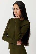 Model wearing the Army Green Gregory Long Sleeve Knit Top, highlighting its slim fit and body-shaping design.