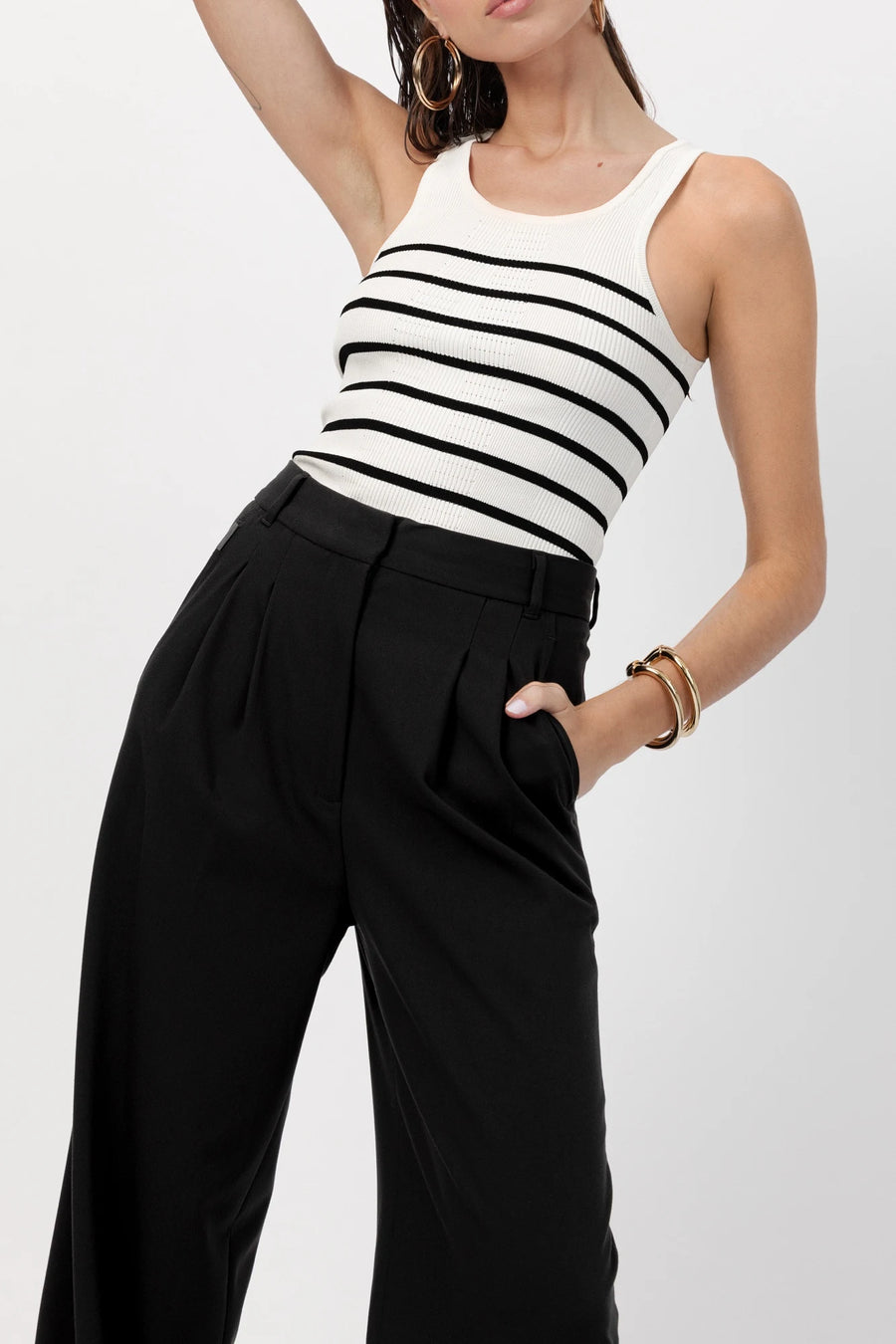 The Maccaden pleated trouser in black by Greyven