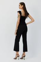 The Porterfield crop nip tuck flare pants in black by Greyven.