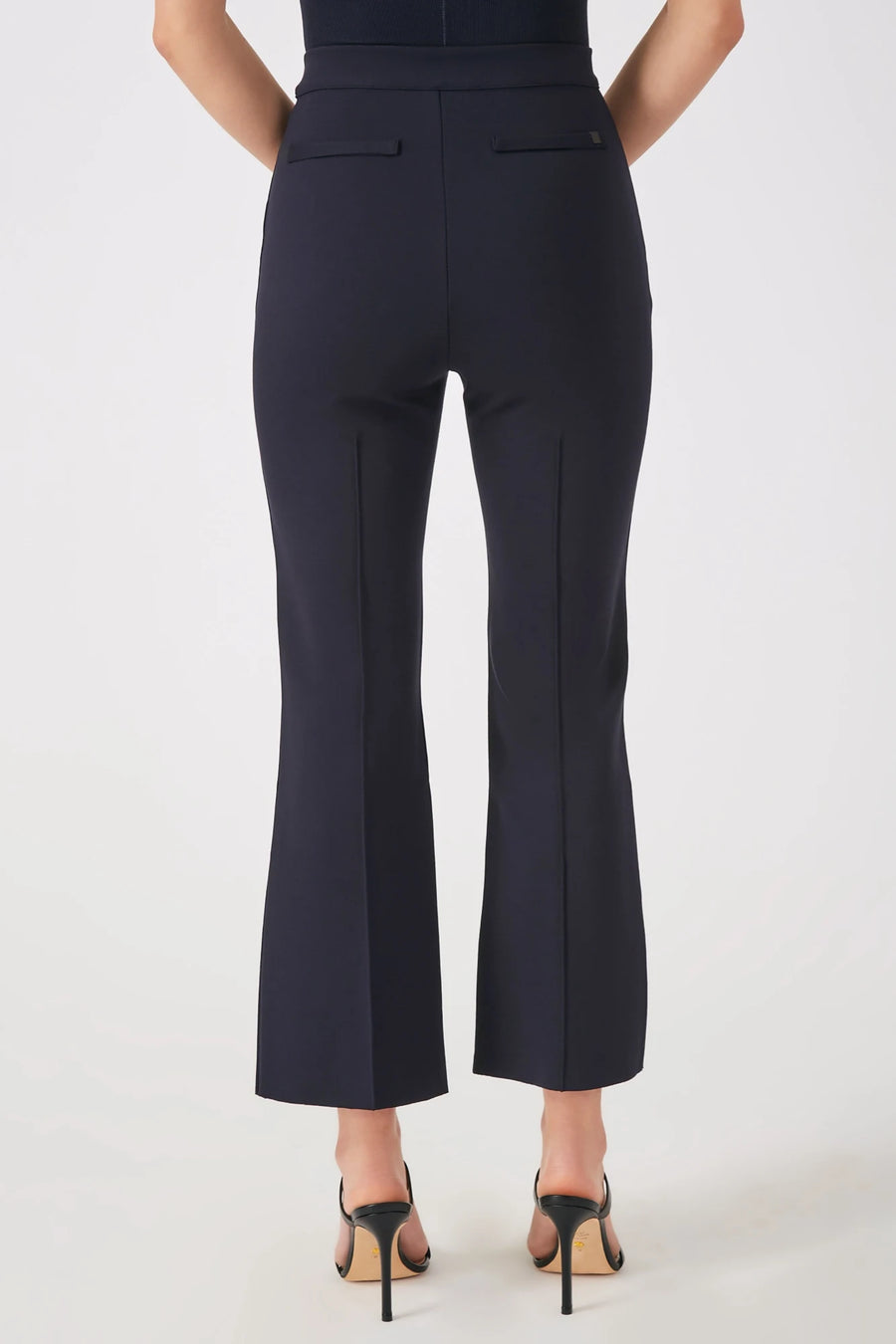 The Porterfield crop nip tuck flare pant in navy by Greyven