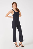 The Porterfield crop nip tuck flare pant in navy by Greyven