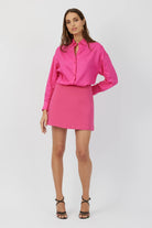 The Pria mini skirt in fuchsia by Greyven