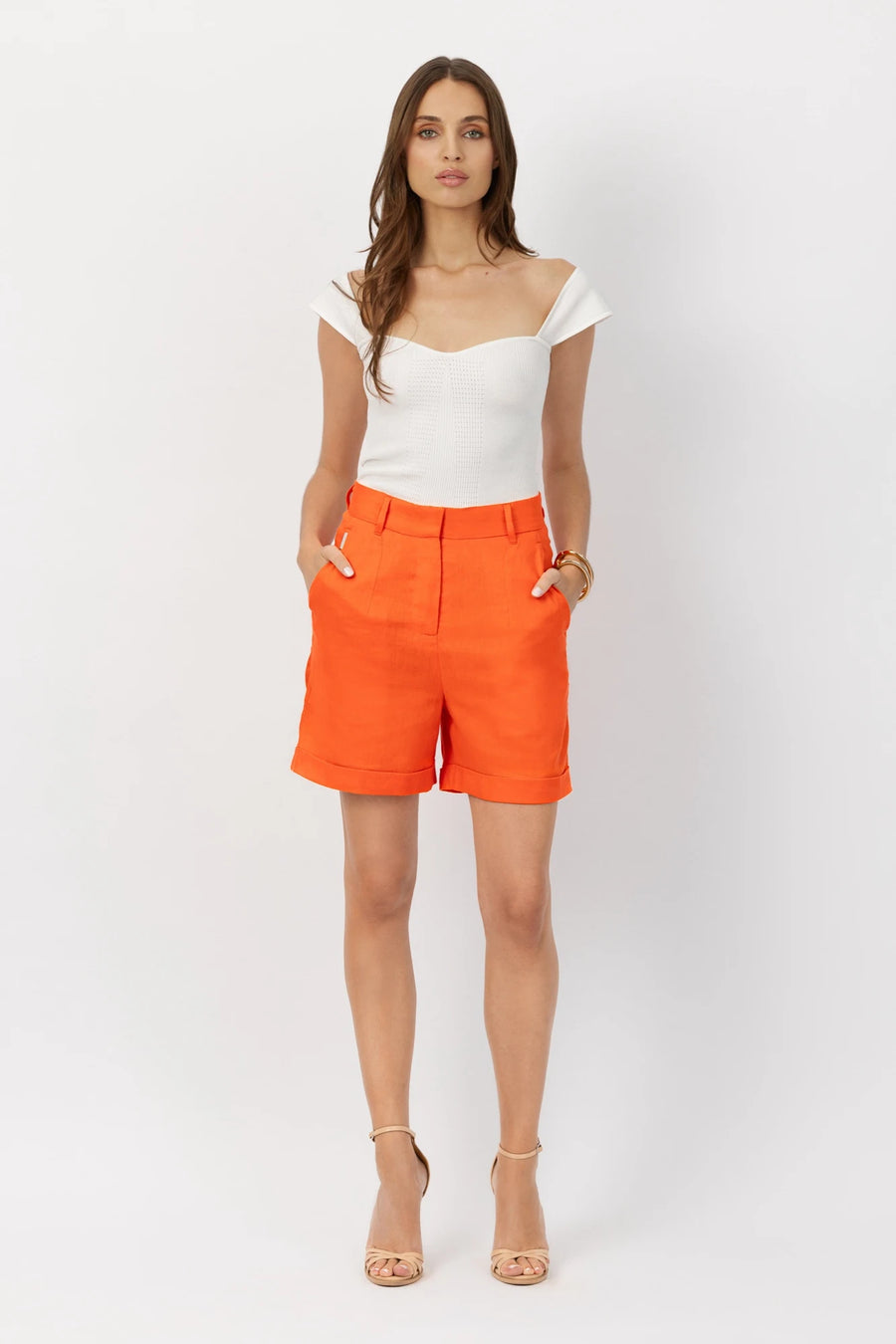 The Remi cuff shorts in orange crush by Greyven