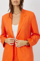 The Riley summer linen blazer in orange crush by Geyven