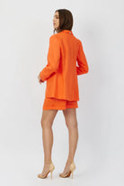 The Riley summer linen blazer in orange crush by Geyven