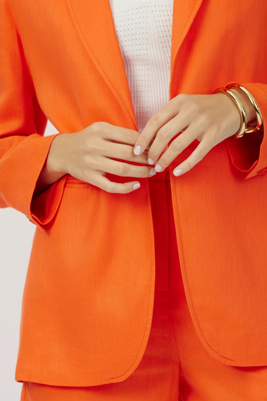 The Riley summer linen blazer in orange crush by Geyven